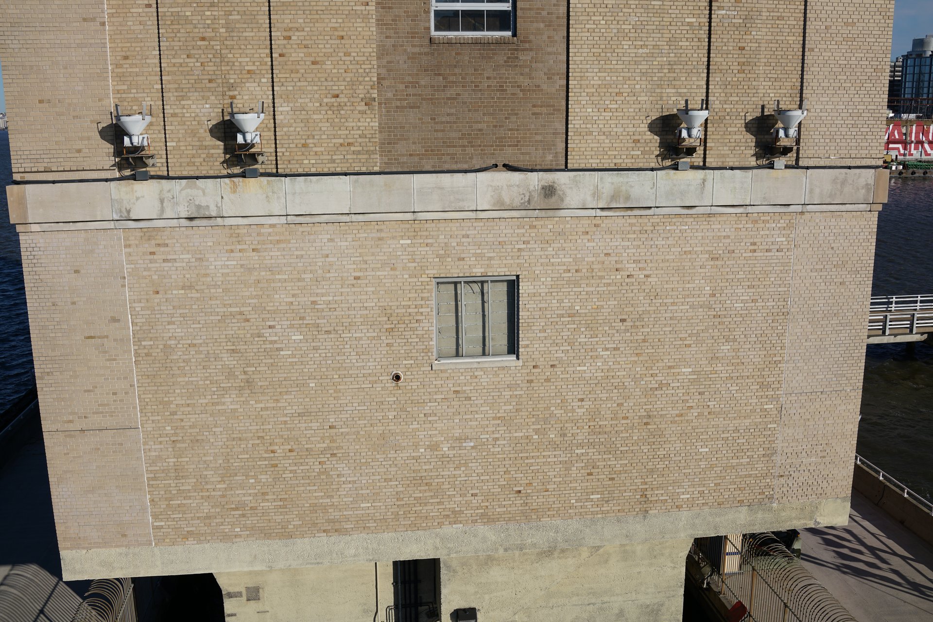 Drone close-up of Holland Tunnel ventilation building architectural detail